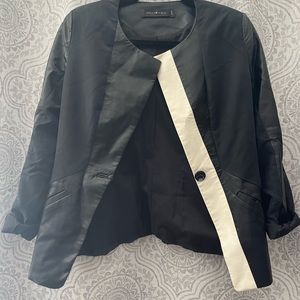 Small fitted blazer. Perfect for fancy work events. Worn once. statement piece.